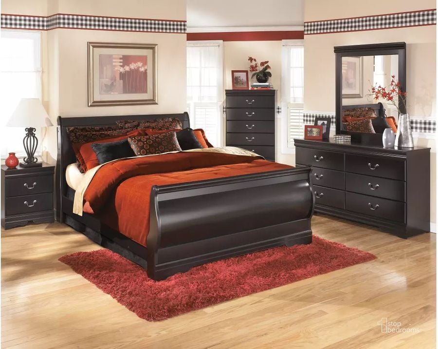The appearance of Huey Vineyard Queen Sleigh Bed designed by Signature Design by Ashley in the transitional interior design. This black piece of furniture  was selected by 1StopBedrooms from Huey Collection to add a touch of cosiness and style into your home. Sku: B128-77;B128-74;B128-98. Bed Type: Sleigh Bed. Material: Wood. Product Type: Sleigh Bed. Bed Size: Queen. Image1