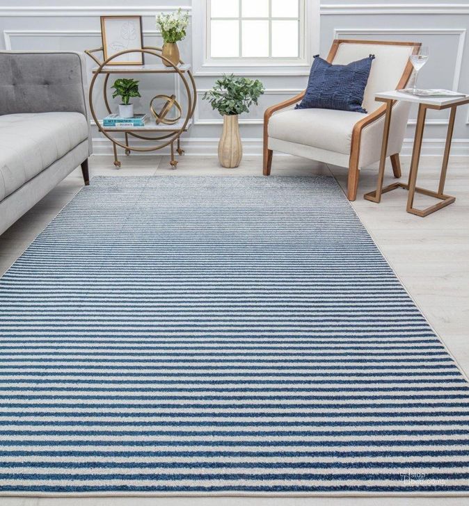 The appearance of Isaac Mizrahi Ja x on CM20B Banded Blue Geometric Contemporary Blue 8' x 10' Area Rug designed by Rugs America in the modern / contemporary interior design. This blue piece of furniture  was selected by 1StopBedrooms from Jaxon Collection to add a touch of cosiness and style into your home. Sku: RA32101. Material: Polypropylene. Product Type: Area Rugs. Image1