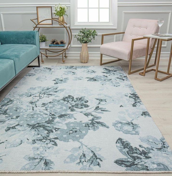 The appearance of Isaac Mizrahi Serafina EO10A Botanical Blue Floral Contemporary Light Blue 2'7 x 8' Area Rug designed by Rugs America in the modern / contemporary interior design. This light blue piece of furniture  was selected by 1StopBedrooms from Serafina Collection to add a touch of cosiness and style into your home. Sku: RA31891. Material: Polyester. Product Type: Area Rugs. Image1