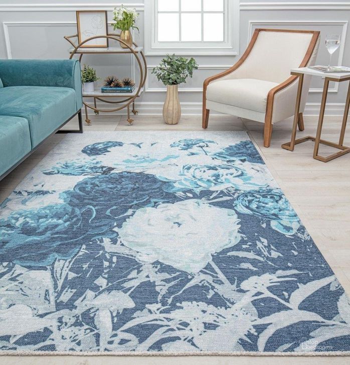 The appearance of Isaac Mizrahi Serafina EO20A Baby Blues Floral Contemporary Blue 2'7 x 8' Area Rug designed by Rugs America in the modern / contemporary interior design. This blue and white piece of furniture  was selected by 1StopBedrooms from Serafina Collection to add a touch of cosiness and style into your home. Sku: RA31903. Material: Polyester. Product Type: Area Rugs. Image1