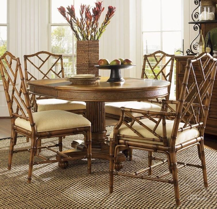 The appearance of Island Estate Plantation Brown Cayman Extendable Dining Room Set designed by Tommy Bahama in the traditional interior design. This brown piece of furniture  was selected by 1StopBedrooms from Island Estate Collection to add a touch of cosiness and style into your home. Sku: 01-0531-870;01-0531-883-01. Table Base Style: Pedestal. Table Top Shape: Round. Product Type: Dining Room Set. Material: Rattan. Size: 42". Image1