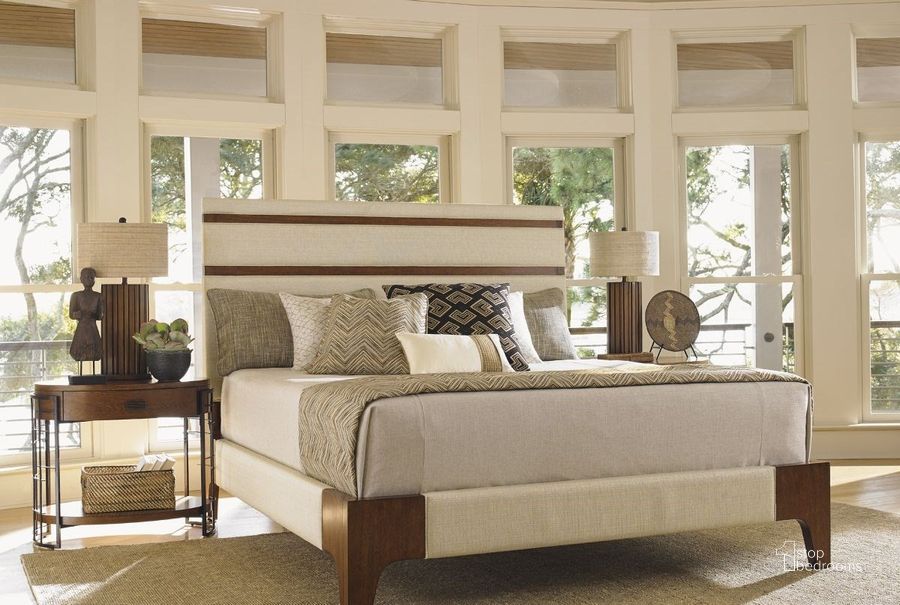 The appearance of Island Fusion Mandarin Upholstered Panel Bedroom Set designed by Tommy Bahama in the transitional interior design. This beige piece of furniture  was selected by 1StopBedrooms from Island Fusion Collection to add a touch of cosiness and style into your home. Sku: 01-0556-133C;01-0556-622. Bed Type: Panel Bed. Material: Wood. Product Type: Panel Bed. Bed Size: Queen. Image1