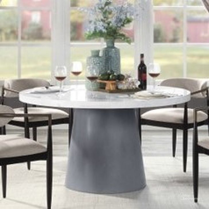 The appearance of Jaramillo Round Dining Table In Black designed by ACME in the  interior design. This black piece of furniture  was selected by 1StopBedrooms from Jaramillo Collection to add a touch of cosiness and style into your home. Sku: DN02141-1;DN02141-2. Table Base Style: Pedestal. Table Top Shape: Round. Product Type: Dining Table. Size: 54.