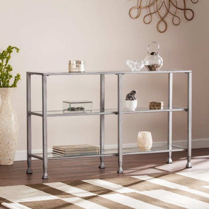 The appearance of Jaymes Metal And Glass 3 Tier Console Table With Media Stand In Silver designed by SEI Furniture in the modern / contemporary interior design. This silver piece of furniture  was selected by 1StopBedrooms from Jaymes Collection to add a touch of cosiness and style into your home. Sku: CM0771. Material: Glass. Product Type: Console Table. Image1