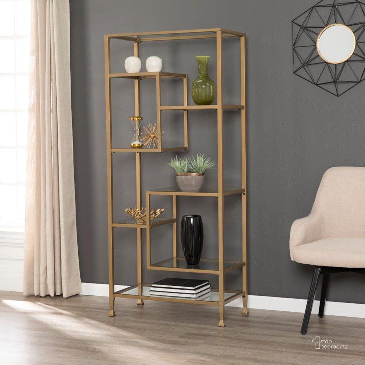 The appearance of Jaymes Metal And Glass Asymmetrical Etagere In Gold designed by SEI Furniture in the modern / contemporary interior design. This gold piece of furniture  was selected by 1StopBedrooms from Jaymes Collection to add a touch of cosiness and style into your home. Sku: HZ5774. Material: Glass. Product Type: Etagere. Image1