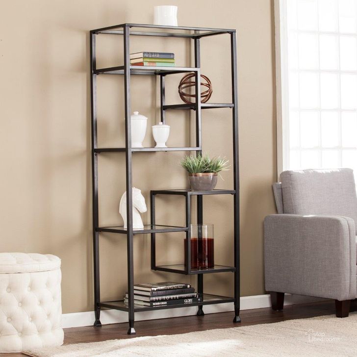 The appearance of Jaymes Metal And Glass Asymmetrical Etagere designed by SEI Furniture in the modern / contemporary interior design. This matte black piece of furniture  was selected by 1StopBedrooms from Jaymes Collection to add a touch of cosiness and style into your home. Sku: HZ1774. Material: Glass. Product Type: Etagere. Image1
