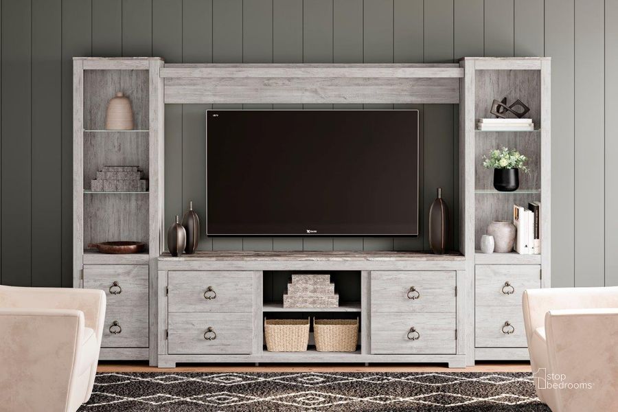 The appearance of Judith Place White Wash Entertainment Center and Wall 0qd24533007c designed by Harbour Home in the transitional interior design. This white wash piece of furniture  was selected by 1StopBedrooms from Judith Place Collection to add a touch of cosiness and style into your home. Sku: W267-168;W267-127;W267-124;W267-124. Material: Wood. Product Type: Entertainment Center. Image1
