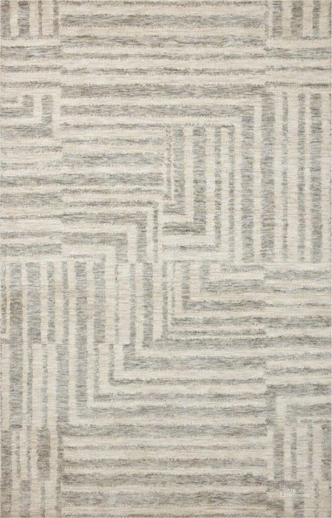 The appearance of Justina Blakeney x Loloi Yeshaia Oatmeal and Silver 18" x 18" Sample Rug designed by Loloi Rugs in the transitional interior design. This oatmeal and silver piece of furniture  was selected by 1StopBedrooms from Yeshaia Collection to add a touch of cosiness and style into your home. Sku: YESHYES-03OTSI160S. Material: Polyester. Product Type: Area Rugs. Image1