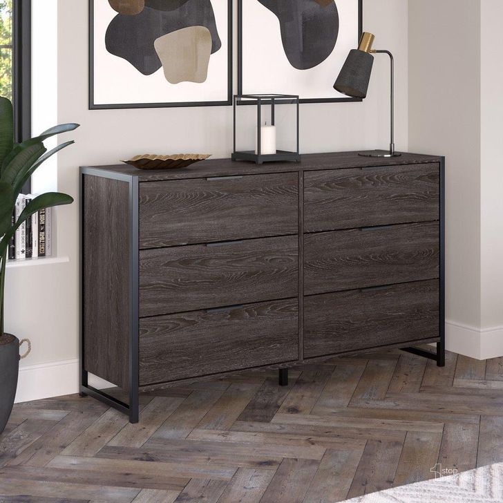The appearance of Kathy Ireland Home By Bush Furniture Atria 6 Drawer Dresser In Charcoal Gray designed by Bush Furniture in the industrial interior design. This charcoal gray piece of furniture  was selected by 1StopBedrooms from Atria Collection to add a touch of cosiness and style into your home. Sku: ARS160CRK. Material: Wood. Product Type: Dresser. Image1