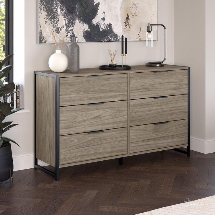 The appearance of Kathy Ireland Home By Bush Furniture Atria 6 Drawer Dresser In Modern Hickory designed by Bush Furniture in the industrial interior design. This hickory piece of furniture  was selected by 1StopBedrooms from Atria Collection to add a touch of cosiness and style into your home. Sku: ARS160MHK. Material: Wood. Product Type: Dresser. Image1