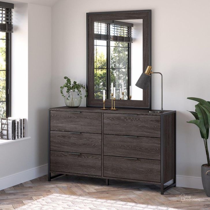 The appearance of Kathy Ireland Home By Bush Furniture Atria 6 Drawer Dresser With Mirror In Charcoal Gray designed by Bush Furniture in the industrial interior design. This charcoal gray piece of furniture  was selected by 1StopBedrooms from Atria Collection to add a touch of cosiness and style into your home. Sku: ATR015CR. Material: Wood. Product Type: Mirror. Image1