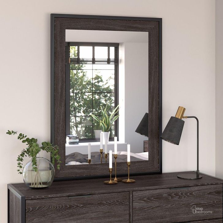 The appearance of Kathy Ireland Home By Bush Furniture Atria Bedroom Mirror In Charcoal Gray designed by Bush Furniture in the industrial interior design. This charcoal gray piece of furniture  was selected by 1StopBedrooms from Atria Collection to add a touch of cosiness and style into your home. Sku: ARA130CR. Material: Wood. Product Type: Mirror. Image1