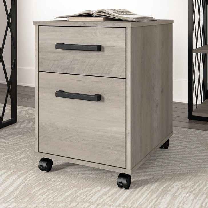 The appearance of Kathy Ireland Home By Bush Furniture City Park 2 Drawer Mobile File Cabinet In Driftwood Gray designed by Bush Furniture in the industrial interior design. This gray piece of furniture  was selected by 1StopBedrooms from City Park Collection to add a touch of cosiness and style into your home. Sku: CPF116DG-03. Material: Wood. Product Type: File Cabinet. Image1