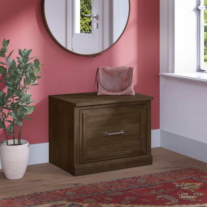 The appearance of Kathy Ireland Home by Bush Furniture Woodland 24W Small Shoe Bench with Drawer in Ash Brown designed by Bush Furniture in the traditional interior design. This brown piece of furniture  was selected by 1StopBedrooms from Woodland Collection to add a touch of cosiness and style into your home. Sku: WDS124ABR-03. Product Type: Shoe Cabinet. Image1