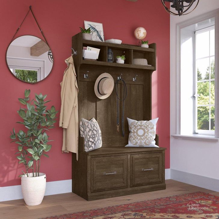 The appearance of Kathy Ireland Home by Bush Furniture Woodland 40W Hall Tree and Shoe Storage Bench with Doors in Ash Brown designed by Bush Furniture in the traditional interior design. This brown piece of furniture  was selected by 1StopBedrooms from Woodland Collection to add a touch of cosiness and style into your home. Sku: WDL001ABR. Product Type: Shoe Cabinet. Image1