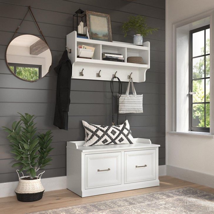 The appearance of Kathy Ireland Home by Bush Furniture Woodland 40W Shoe Storage Bench with Doors and Wall Mounted Coat Rack in White Ash designed by Bush Furniture in the traditional interior design. This off white piece of furniture  was selected by 1StopBedrooms from Woodland Collection to add a touch of cosiness and style into your home. Sku: WDL003WAS. Product Type: Shoe Cabinet. Image1