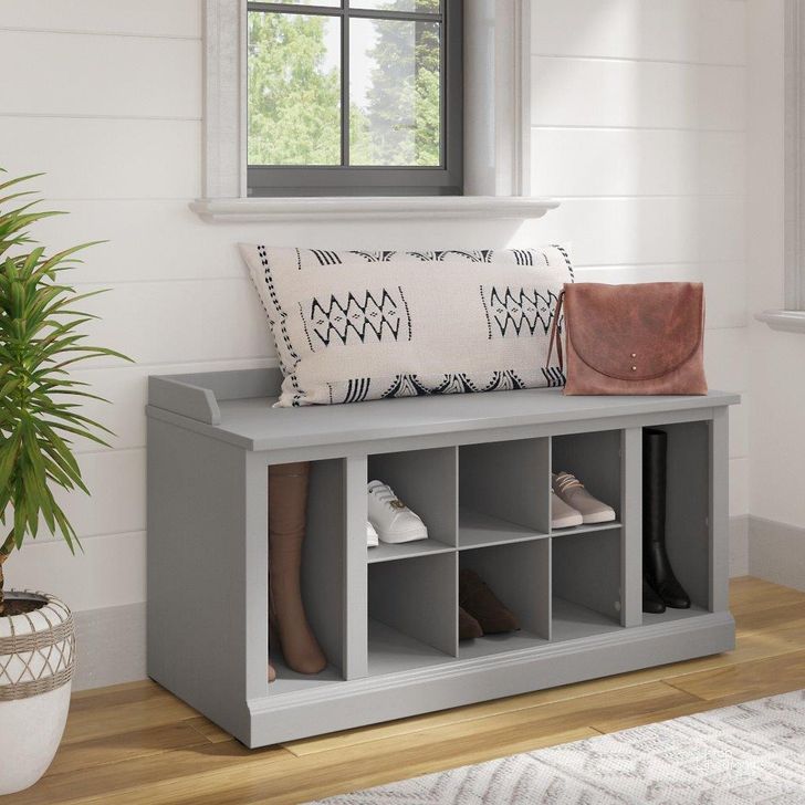 The appearance of Kathy Ireland Home by Bush Furniture Woodland 40W Shoe Storage Bench with Shelves in Cape Cod Gray designed by Bush Furniture in the traditional interior design. This gray piece of furniture  was selected by 1StopBedrooms from Woodland Collection to add a touch of cosiness and style into your home. Sku: WDS240CG-03. Product Type: Shoe Cabinet. Image1