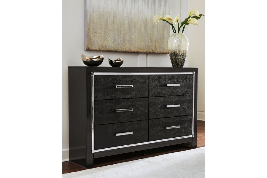 The appearance of Kaydell Black Dresser designed by Signature Design by Ashley in the modern / contemporary interior design. This black piece of furniture  was selected by 1StopBedrooms from Kaydell Collection to add a touch of cosiness and style into your home. Sku: B1420-31. Material: Wood. Product Type: Dresser. Image1
