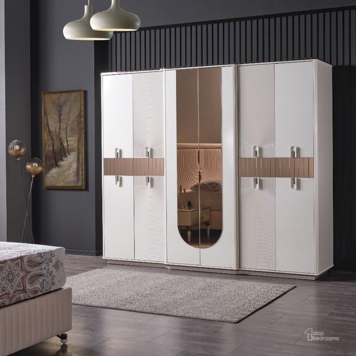 The appearance of Kuvars 6 Door Wardrobe In Cream designed by Furnia in the modern / contemporary interior design. This cream piece of furniture  was selected by 1StopBedrooms from Kuvars Collection to add a touch of cosiness and style into your home. Sku: 120-KUV-WRD-6. Material: Wood. Product Type: Wardrobe. Image1