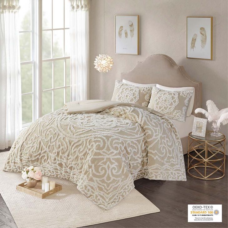 The appearance of Laetitia Cotton Tufted Queen Comforter Set In Taupe designed by Olliix in the modern / contemporary interior design. This taupe piece of furniture  was selected by 1StopBedrooms from Laetitia Collection to add a touch of cosiness and style into your home. Sku: MP10-7114. Material: Polyester. Bed Size: Queen. Product Type: Comforter Set. Image1