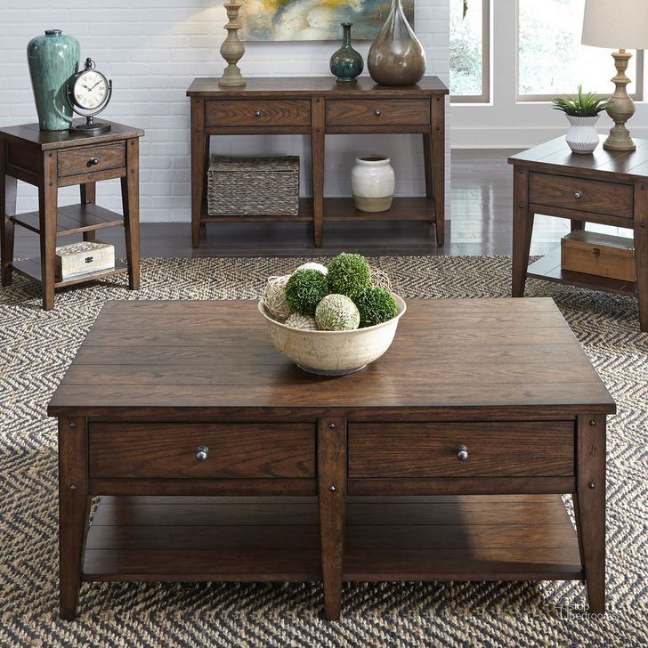 The appearance of Lake House Brown Occasional Table Set designed by Liberty in the traditional interior design. This rustic brown piece of furniture  was selected by 1StopBedrooms from Lake House Collection to add a touch of cosiness and style into your home. Sku: 210-OT1015;210-OT1022. Material: Wood. Product Type: Occasional Table Set. Table Top Shape: Rectangular. Image1
