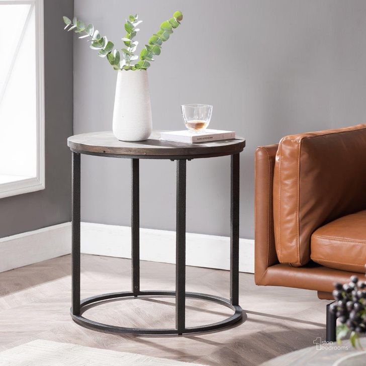 The appearance of Landsmill Round Industrial End Table designed by SEI Furniture in the industrial interior design. This natural piece of furniture  was selected by 1StopBedrooms from Landsmill Collection to add a touch of cosiness and style into your home. Sku: CK2682. Material: Wood. Product Type: End Table. Image1