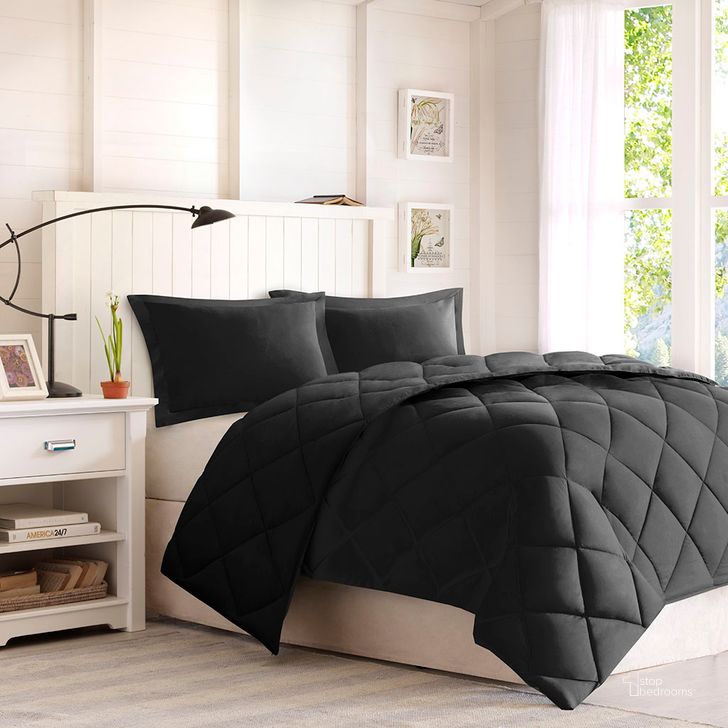 The appearance of Larkspur Polyester Microfiber Solid Twin Comforter Mini Set In Black/Black designed by Olliix in the transitional interior design. This black/black piece of furniture  was selected by 1StopBedrooms from Larkspur Collection to add a touch of cosiness and style into your home. Sku: BASI10-0281. Material: Polyester. Bed Size: Twin. Product Type: Comforter Set. Image1