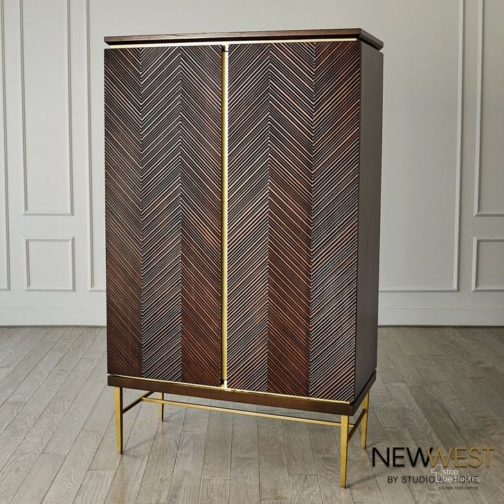 The appearance of Latilla Tall Bar Cabinet In Brown designed by Global Views in the modern / contemporary interior design. This brown piece of furniture  was selected by 1StopBedrooms from Latilla Collection to add a touch of cosiness and style into your home. Sku: NW7.90019. Product Type: Cabinet. Material: Brass. Image1