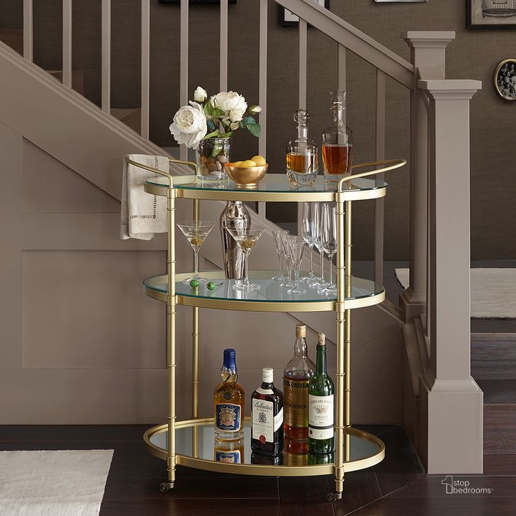 The appearance of Lauren Bar Cart In Antique Gold designed by Olliix in the modern / contemporary interior design. This antique gold piece of furniture  was selected by 1StopBedrooms from Lauren Collection to add a touch of cosiness and style into your home. Sku: MPS135-0049. Material: Metal. Product Type: Bar Cart. Image1