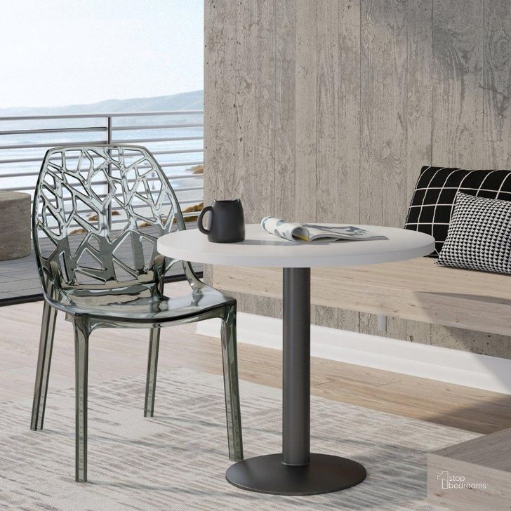 The appearance of LeisureMod Cornelia Black Dining Chair designed by LeisureMod in the modern / contemporary interior design. This transparent black piece of furniture  was selected by 1StopBedrooms from Cornelia Collection to add a touch of cosiness and style into your home. Sku: C18TBL. Product Type: Dining Chair. Material: Plastic. Image1