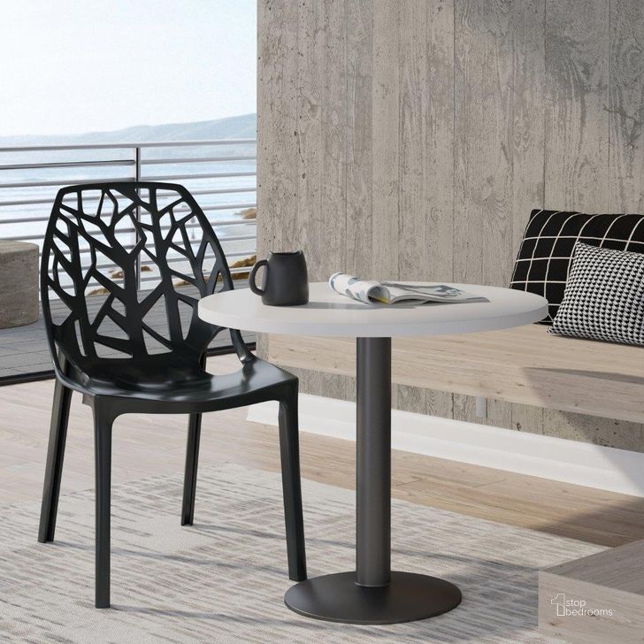 The appearance of Leisuremod Modern Cornelia Dining Chair In Black designed by LeisureMod in the modern / contemporary interior design. This black piece of furniture  was selected by 1StopBedrooms from Cornelia Collection to add a touch of cosiness and style into your home. Sku: C18SBL. Product Type: Dining Chair. Material: Plastic. Image1