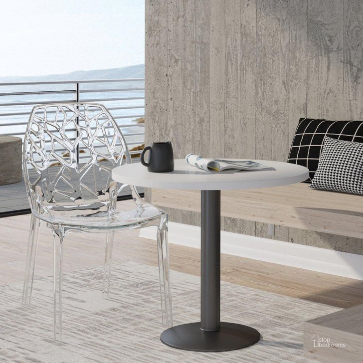 The appearance of LeisureMod Cornelia Clear Dining Chair designed by LeisureMod in the modern / contemporary interior design. This clear piece of furniture  was selected by 1StopBedrooms from Cornelia Collection to add a touch of cosiness and style into your home. Sku: C18CL. Product Type: Dining Chair. Material: Plastic. Image1
