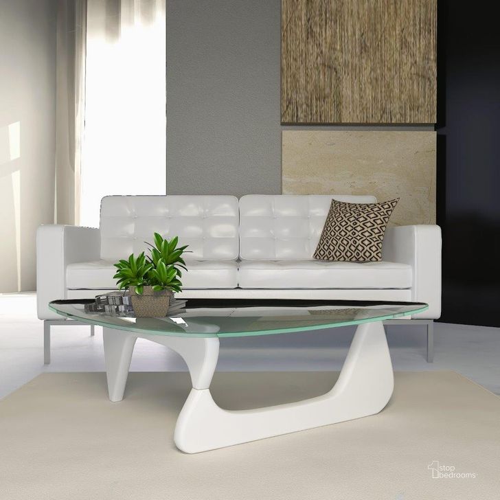 The appearance of LeisureMod Imperial White Triangle Coffee Table designed by LeisureMod in the modern / contemporary interior design. This white piece of furniture  was selected by 1StopBedrooms from Imperial Collection to add a touch of cosiness and style into your home. Sku: NG52W. Material: Glass. Product Type: Coffee Table. Image1