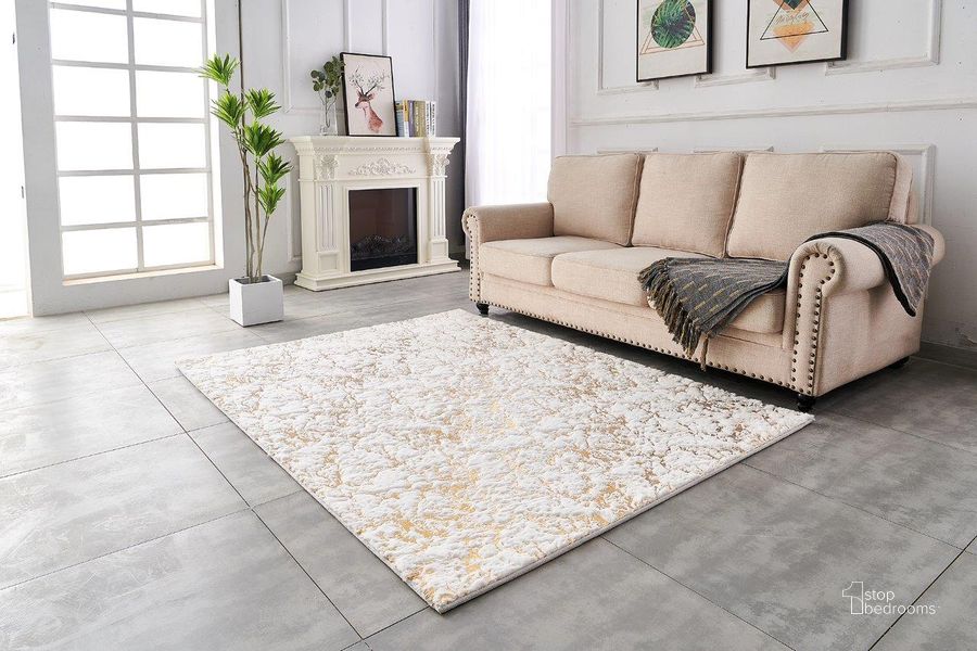 The appearance of Lily Luxury Chinchilla Faux Fur Abstract Gilded Rectangular Area Rug In Gold and White - RSRGLDSPWT-57 designed by Amazing Rugs in the modern / contemporary interior design. This gold and white piece of furniture  was selected by 1StopBedrooms from Lily Collection to add a touch of cosiness and style into your home. Sku: RSRGLDSPWT-57. Material: Polyester. Product Type: Area Rugs. Image1