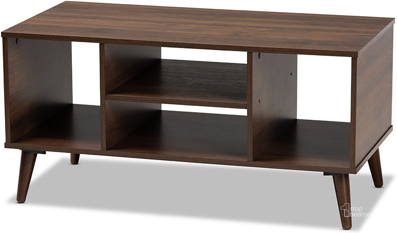 The appearance of Linas Mid-Century Modern Walnut Finished Coffee Table designed by Baxton Studio in the modern / contemporary interior design. This walnut piece of furniture  was selected by 1StopBedrooms from Linas Collection to add a touch of cosiness and style into your home. Sku: CT8001-Columbia Walnut-CT. Product Type: Coffee Table. Material: Rubberwood. Image1