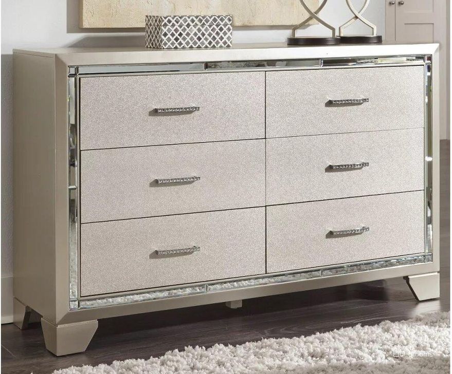 The appearance of Lonnix Silver Dresser designed by Signature Design by Ashley in the modern / contemporary interior design. This silver piece of furniture  was selected by 1StopBedrooms from Lonnix Collection to add a touch of cosiness and style into your home. Sku: B410-21. Material: Glass. Product Type: Dresser. Image1