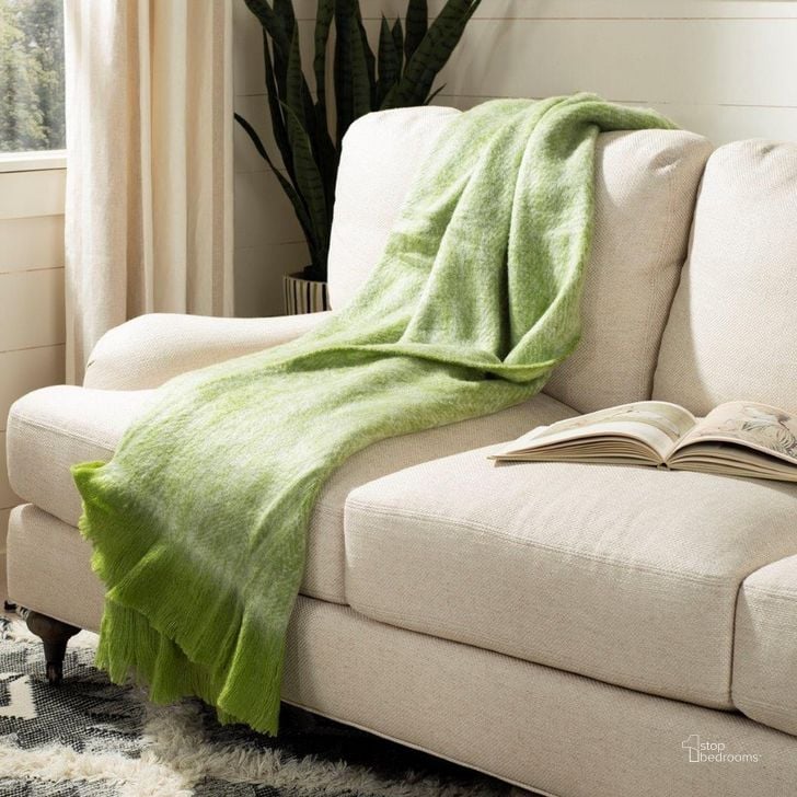 The appearance of Lonny Throw THR607A-5070 designed by Safavieh in the modern / contemporary interior design. This green piece of furniture  was selected by 1StopBedrooms from Lonny Collection to add a touch of cosiness and style into your home. Sku: THR607A-5070. Product Type: Pillows and Throw. Material: Acrylic. Image1