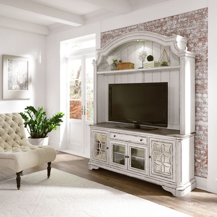 The appearance of Magnolia Manor Antique White Entertainment Center designed by Liberty in the transitional interior design. This antique white piece of furniture  was selected by 1StopBedrooms from Magnolia Manor Collection to add a touch of cosiness and style into your home. Sku: 244-EC74;244-TV74. Material: Wood. Product Type: Entertainment Center. Image1