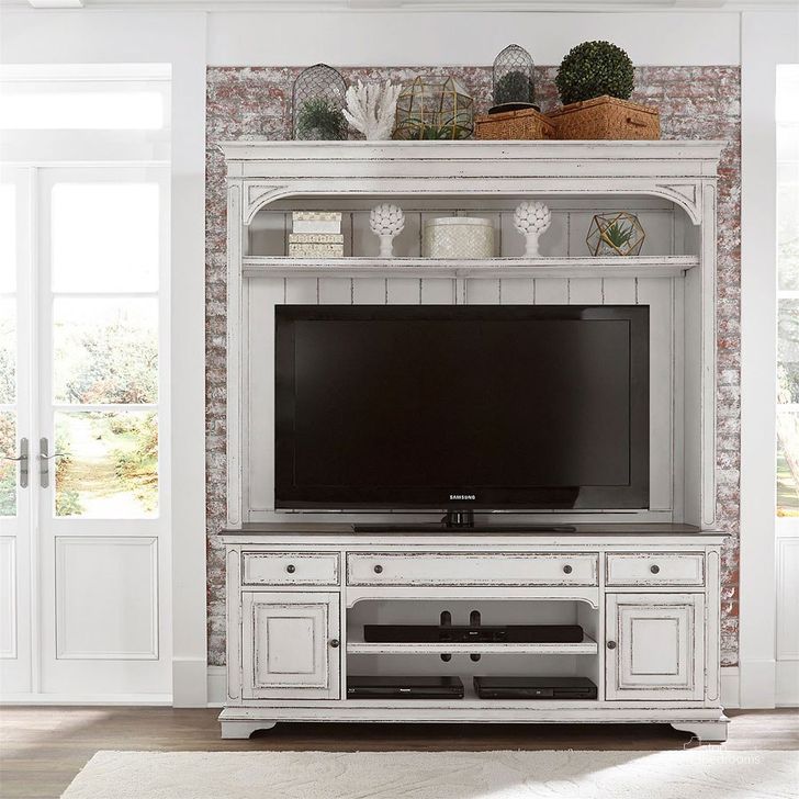 The appearance of Magnolia Manor Entertainment Center W/ 74 Inch Tv Stand designed by Liberty in the traditional interior design. This antique white piece of furniture  was selected by 1StopBedrooms from Magnolia Manor Collection to add a touch of cosiness and style into your home. Sku: 244-EC00;244-TV70. Product Type: Entertainment Centers and Wall. Image1