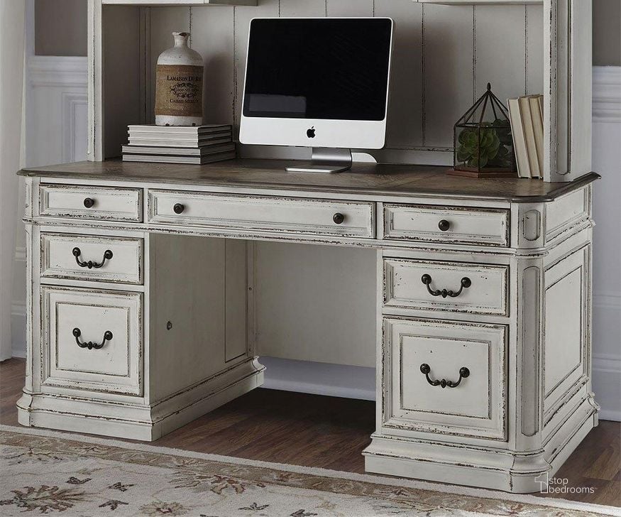 The appearance of Magnolia Manor Jr Executive Credenza designed by Liberty in the traditional interior design. This antique white piece of furniture  was selected by 1StopBedrooms from Magnolia Manor Collection to add a touch of cosiness and style into your home. Sku: 244-HO120B;244-HO120T. Product Type: Credenza. Image1