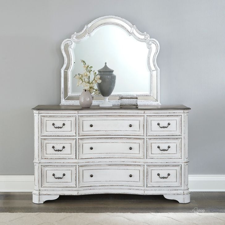 The appearance of Magnolia Manor Opt Dresser And Mirror In White designed by Liberty in the traditional interior design. This antique white piece of furniture  was selected by 1StopBedrooms from Magnolia Manor Collection to add a touch of cosiness and style into your home. Sku: 244-BR34;244-BR53. Product Type: Dresser and Mirror. Material: Rubberwood.
