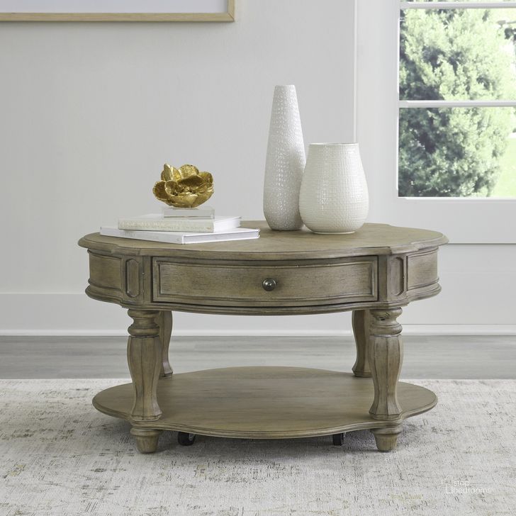 The appearance of Magnolia Manor Round Cocktail Table In Weathered Bisque designed by Liberty in the traditional interior design. This bisque piece of furniture  was selected by 1StopBedrooms from Magnolia Manor Collection to add a touch of cosiness and style into your home. Sku: 244N-OT1011. Product Type: Cocktail Table. Material: Poplar.
