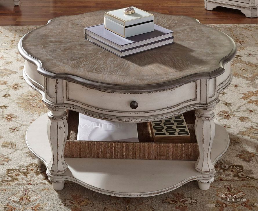 The appearance of Magnolia Manor Round Occasional Table Set designed by Liberty in the traditional interior design. This antique white piece of furniture  was selected by 1StopBedrooms from Magnolia Manor Collection to add a touch of cosiness and style into your home. Sku: 244-OT1011;244-OT1020. Table Top Shape: Round. Material: Wood. Product Type: Occasional Table Set. Image1