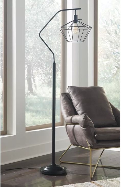 The appearance of Makeika Black Metal Floor Lamp designed by Signature Design by Ashley in the modern / contemporary interior design. This black piece of furniture  was selected by 1StopBedrooms from Makeika Collection to add a touch of cosiness and style into your home. Sku: L207181. Material: Metal. Product Type: Floor Lamp. Image1
