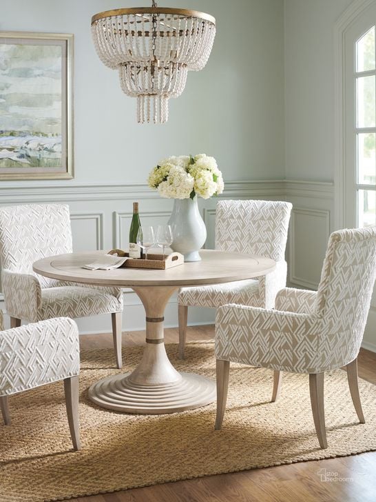 The appearance of Malibu Grey Topanga Round Dining Room Set designed by Barclay Butera in the modern / contemporary interior design. This beige piece of furniture  was selected by 1StopBedrooms from Malibu Collection to add a touch of cosiness and style into your home. Sku: 01-0926-870C;01-0926-880-01. Table Base Style: Pedestal. Table Top Shape: Round. Product Type: Dining Room Set. Image1
