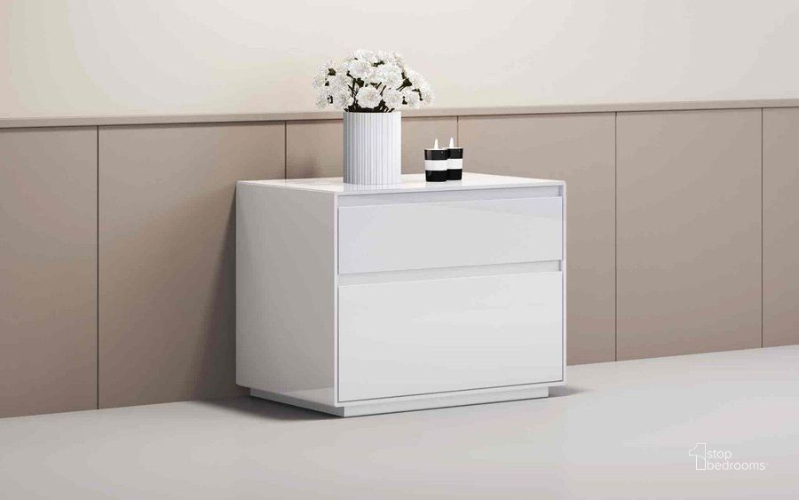 The appearance of Malibu Night Stand In High Gloss White designed by Whiteline Modern Living in the modern / contemporary interior design. This white piece of furniture  was selected by 1StopBedrooms from Malibu Collection to add a touch of cosiness and style into your home. Sku: NS1367-WHT. Product Type: Nightstand. Image1