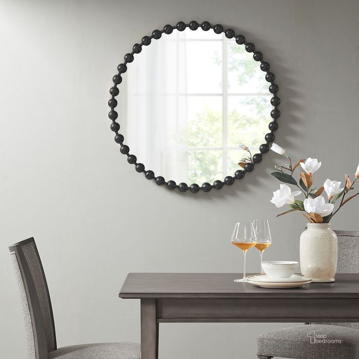 The appearance of Marlowe Round Wall Decor Mirror In Black MPS95F-0037 designed by Olliix in the modern / contemporary interior design. This black piece of furniture  was selected by 1StopBedrooms from Marlowe Collection to add a touch of cosiness and style into your home. Sku: MPS95F-0037. Material: Metal. Product Type: Mirror. Image1