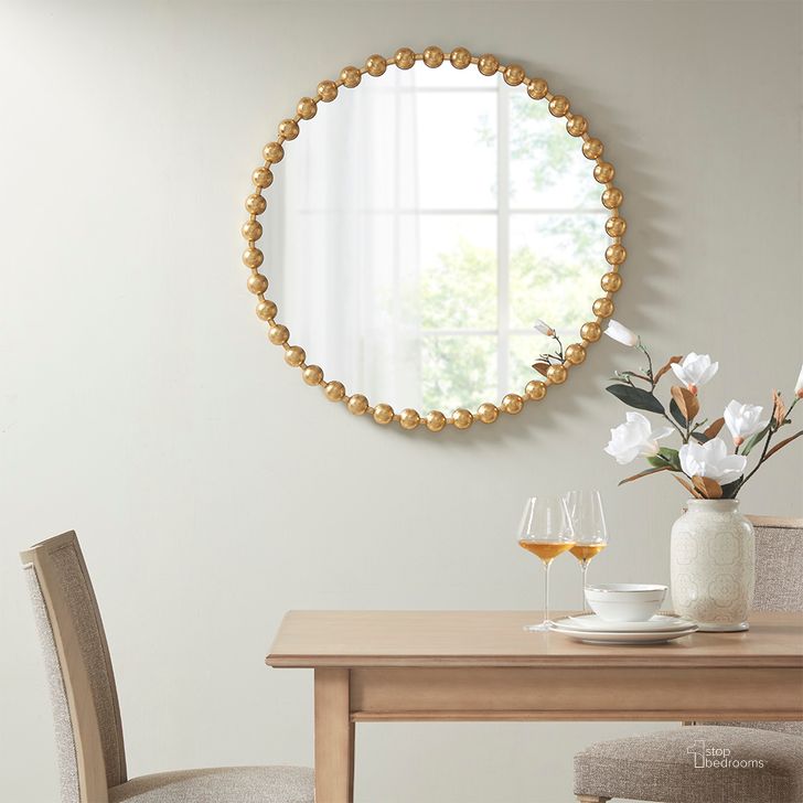 The appearance of Marlowe Round Wall Decor Mirror In Gold MPS160-279 designed by Olliix in the modern / contemporary interior design. This gold piece of furniture  was selected by 1StopBedrooms from Marlowe Collection to add a touch of cosiness and style into your home. Sku: MPS160-279. Product Type: Mirror. Material: MDF. Image1