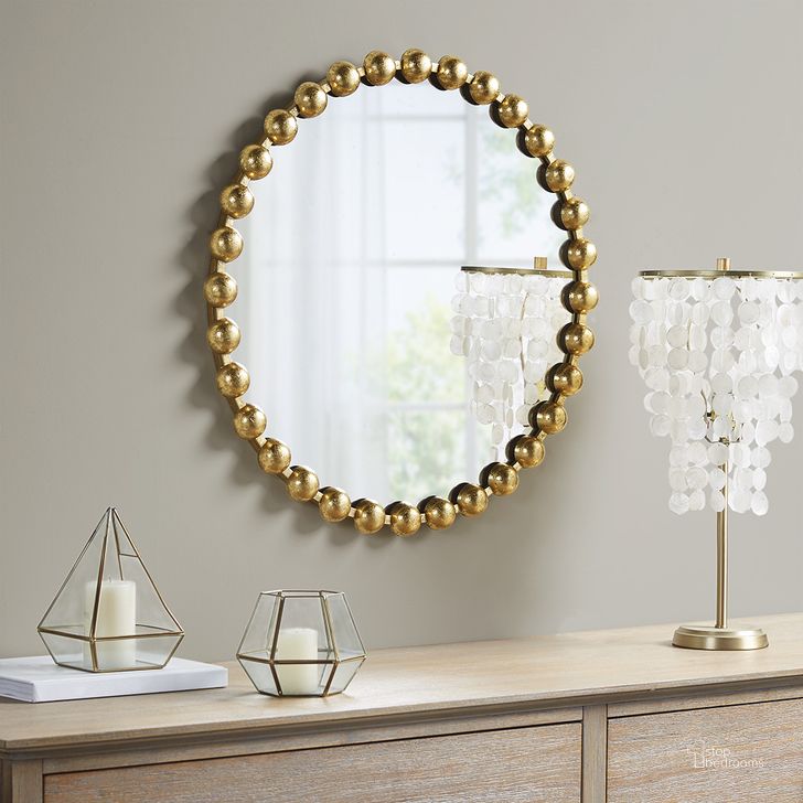 The appearance of Marlowe Round Wall Decor Mirror In Gold MPS95F-0034 designed by Olliix in the modern / contemporary interior design. This gold piece of furniture  was selected by 1StopBedrooms from Marlowe Collection to add a touch of cosiness and style into your home. Sku: MPS95F-0034. Product Type: Mirror. Material: MDF. Image1