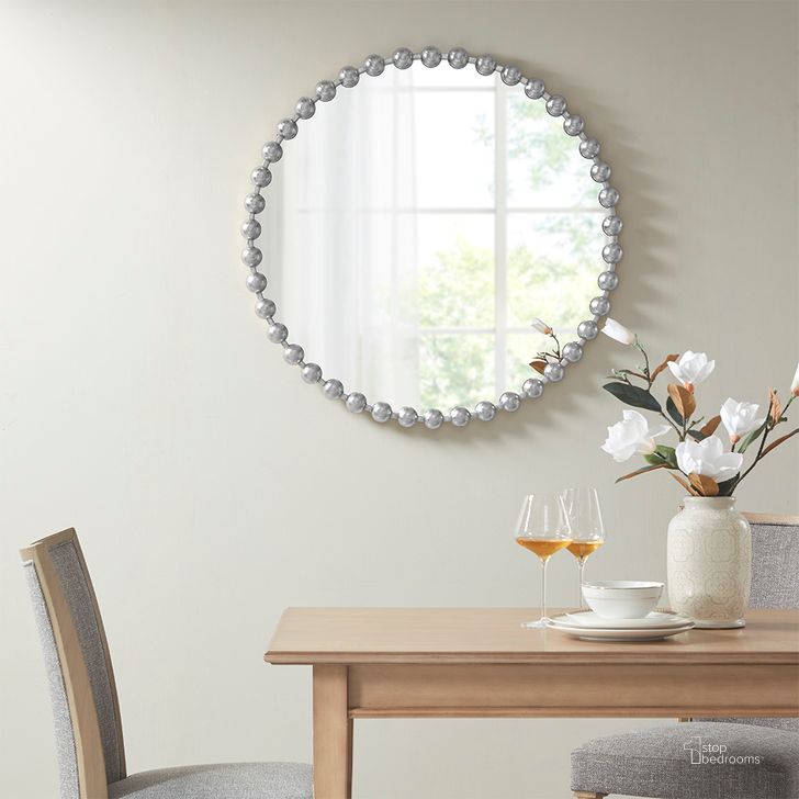 The appearance of Marlowe Round Wall Decor Mirror In Silver MPS160-339 designed by Olliix in the modern / contemporary interior design. This silver piece of furniture  was selected by 1StopBedrooms from Marlowe Collection to add a touch of cosiness and style into your home. Sku: MPS160-339. Product Type: Mirror. Material: MDF. Image1